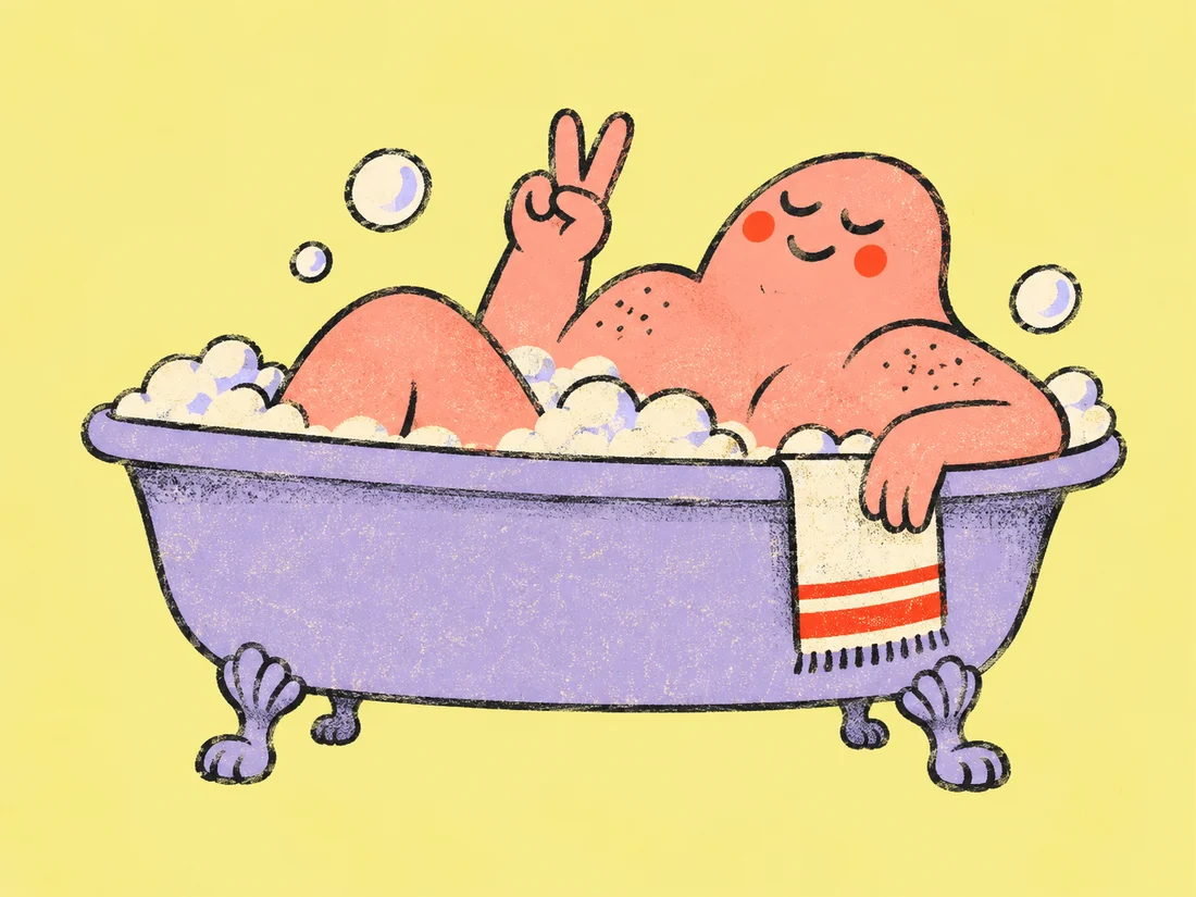 A happy peach-colored character relaxing in a lilac bathtub and giving a peace sign.